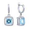 A beautiful pair of Blue Topaz 8mm earrings with CZ accents made in sterling 925 silver